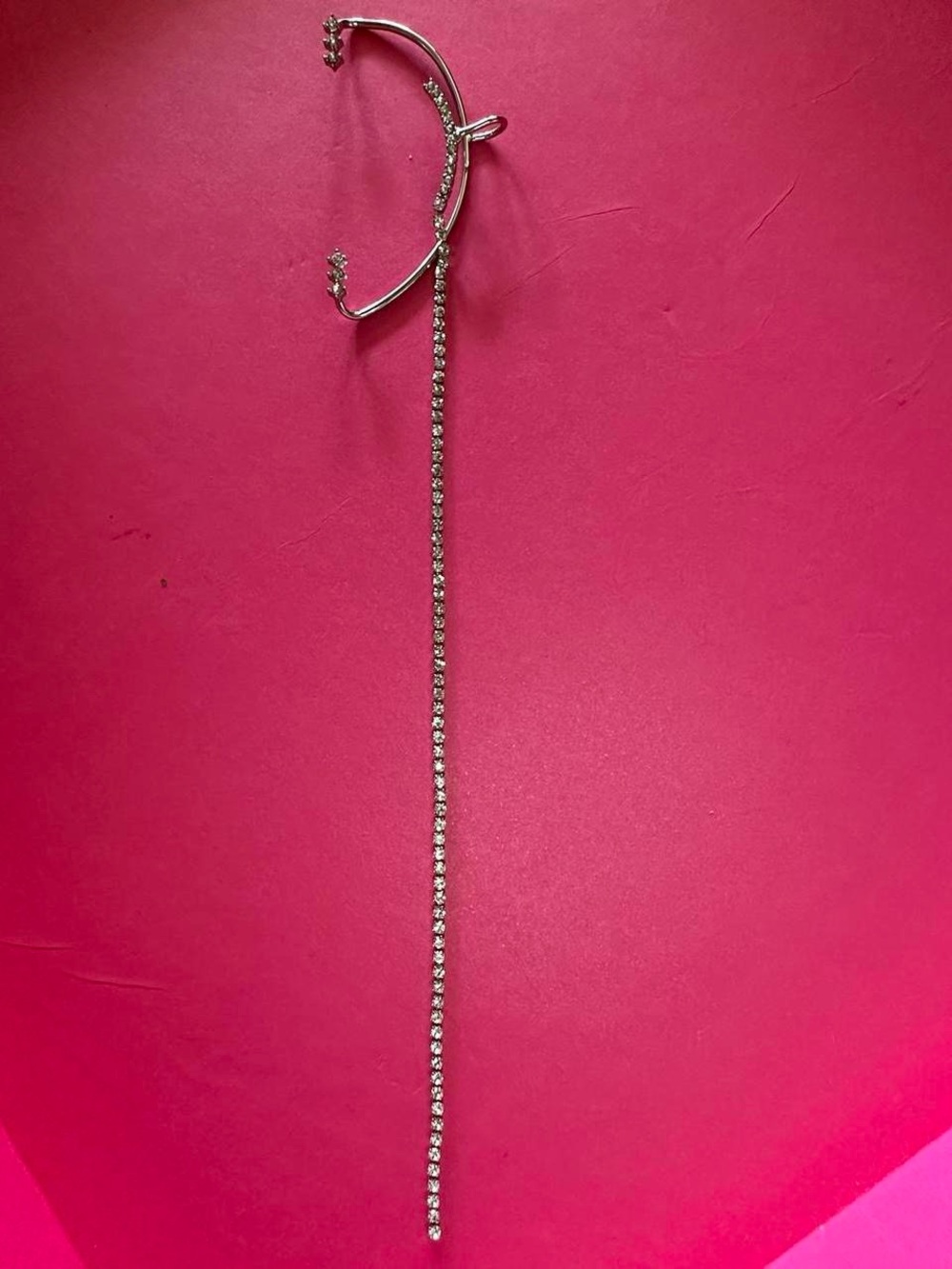 Rhinestone silver ear cuff.